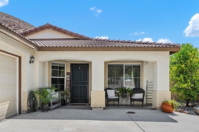 23317 Badger Creek Ln, Menifee, CA 92587 - view of exterior entry with stucco siding