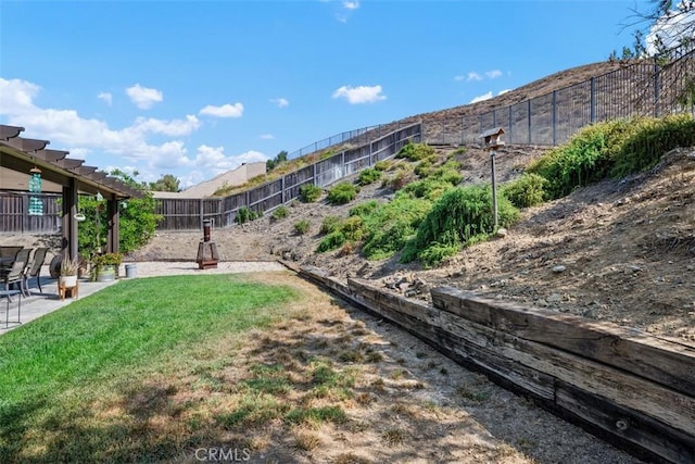 23317 Badger Creek Ln, Menifee, CA 92587 - fenced backyard featuring a patio