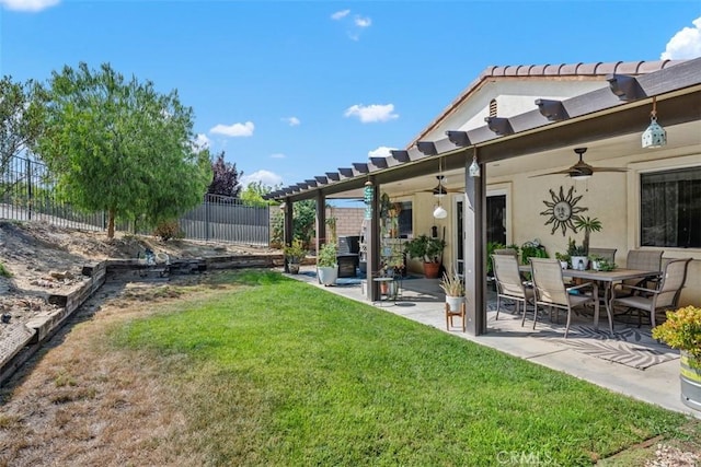 23317 Badger Creek Ln, Menifee, CA 92587 - view of yard featuring a ceiling fan and a patio