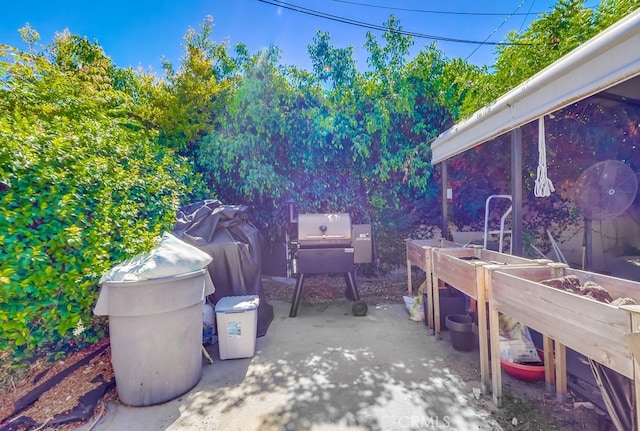 8192 Ashgrove Dr, La Mirada, CA 90638 - view of patio with a grill and a garden