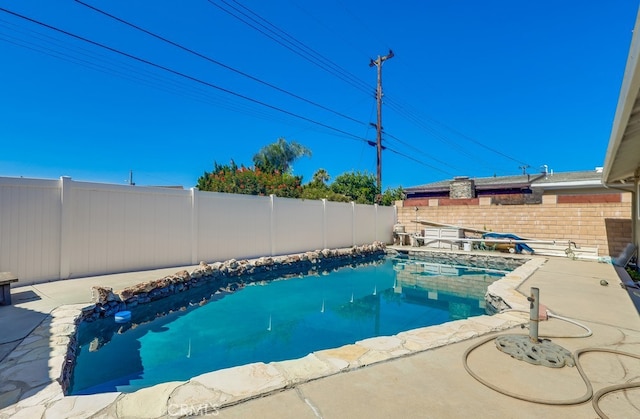 8192 Ashgrove Dr, La Mirada, CA 90638 - view of swimming pool with a fenced backyard, a patio, and a pool with connected hot tub