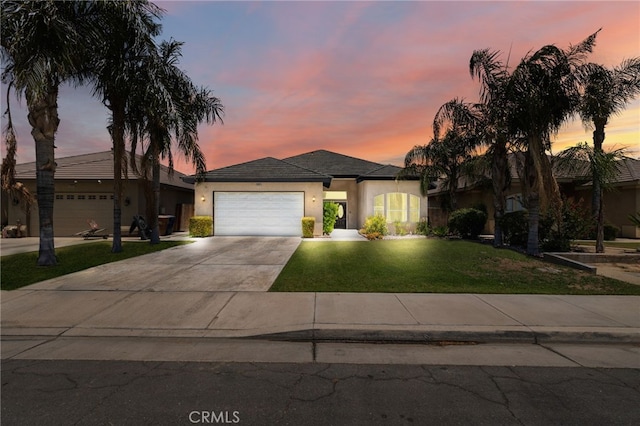 2802 Silver Shore Ln, Bakersfield, CA 93313 - ranch-style house with an attached garage, concrete driveway, stucco siding, and a lawn
