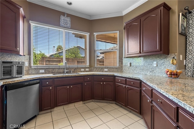 2802 Silver Shore Ln, Bakersfield, CA 93313 - kitchen with stainless steel dishwasher, tasteful backsplash, ornamental molding, light tile patterned floors, and light stone countertops