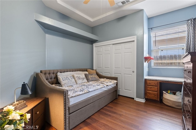 2802 Silver Shore Ln, Bakersfield, CA 93313 - bedroom with dark wood-style floors, a closet, and a ceiling fan