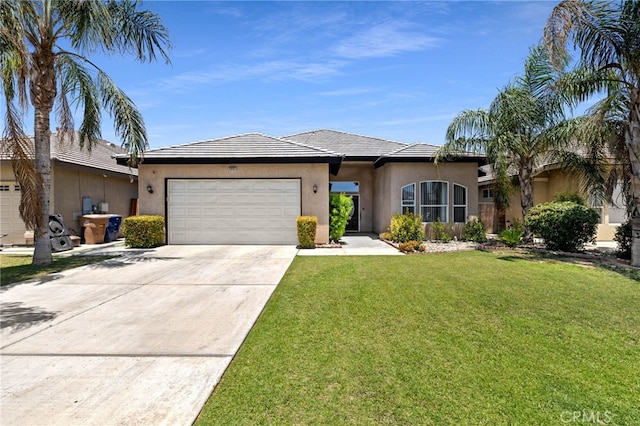 2802 Silver Shore Ln, Bakersfield, CA 93313 - view of front facade with stucco siding, a garage, concrete driveway, a front yard, and a tiled roof