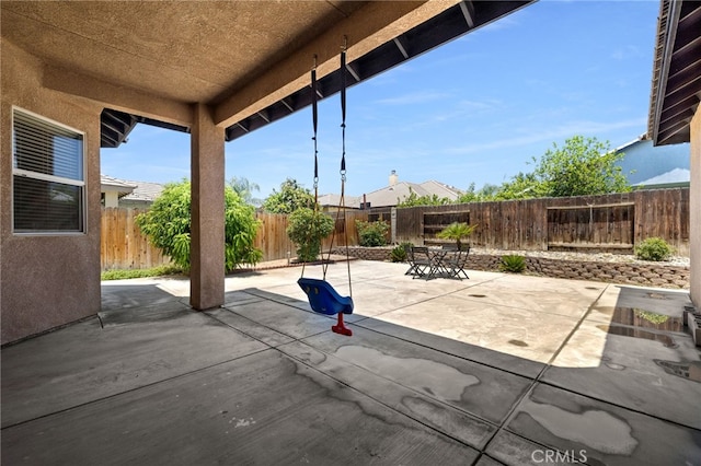 2802 Silver Shore Ln, Bakersfield, CA 93313 - fenced backyard with a patio area and outdoor dining space