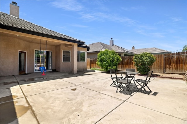 2802 Silver Shore Ln, Bakersfield, CA 93313 - fenced backyard with a patio area and outdoor dining space