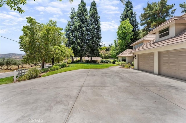 1624 Alessandro Rd, Redlands, CA 92373 - exterior space featuring driveway and a garage