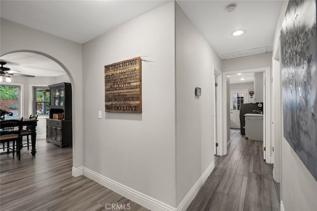 1624 Alessandro Rd, Redlands, CA 92373 - hall featuring dark wood finished floors, arched walkways, and recessed lighting