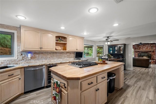 1624 Alessandro Rd, Redlands, CA 92373 - kitchen featuring appliances with stainless steel finishes, butcher block countertops, light brown cabinetry, wine cooler, and ceiling fan