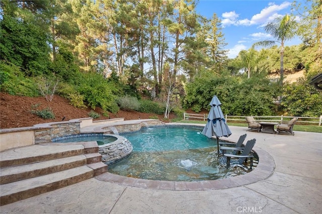 1624 Alessandro Rd, Redlands, CA 92373 - view of pool featuring a patio area, a pool with connected hot tub, and view of scattered trees