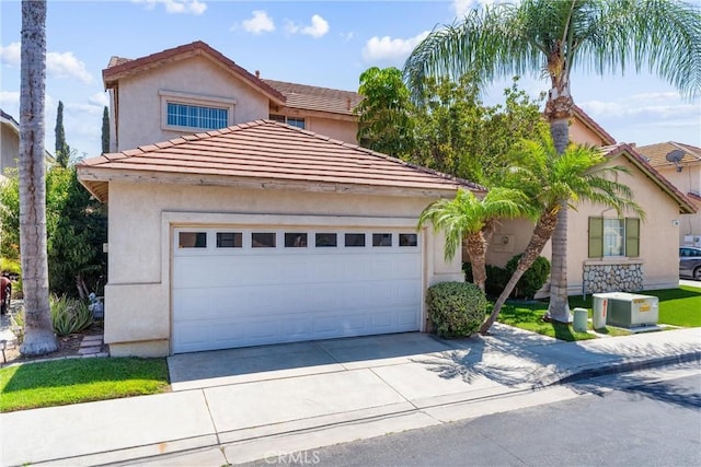 861 Shade Tree Way, Corona, CA 92878 - view of front of property featuring concrete driveway, stucco siding, a garage, and a tiled roof