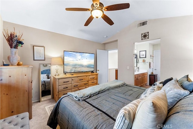 861 Shade Tree Way, Corona, CA 92878 - bedroom with light carpet, vaulted ceiling, connected bathroom, and ceiling fan