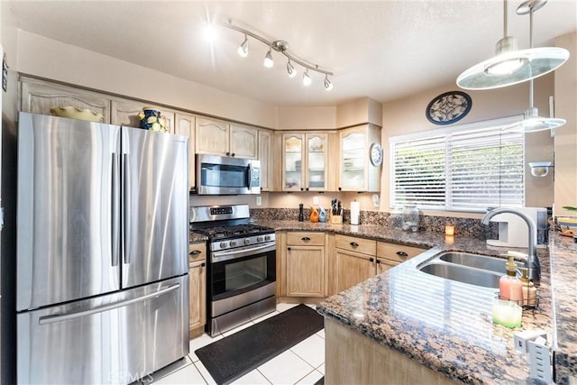 861 Shade Tree Way, Corona, CA 92878 - kitchen featuring stainless steel appliances, light brown cabinetry, glass insert cabinets, light tile patterned floors, and dark stone countertops