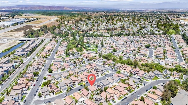 861 Shade Tree Way, Corona, CA 92878 - aerial overview of property's location with nearby suburban area and a water and mountain view