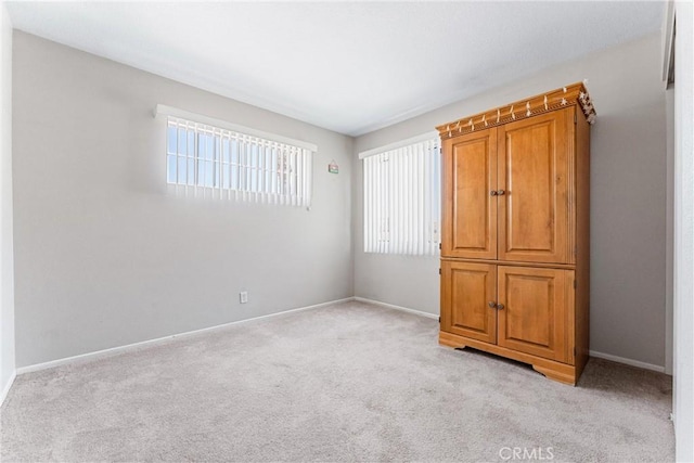861 Shade Tree Way, Corona, CA 92878 - unfurnished bedroom with light colored carpet