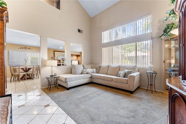 861 Shade Tree Way, Corona, CA 92878 - living area with light tile patterned floors, plenty of natural light, and high vaulted ceiling