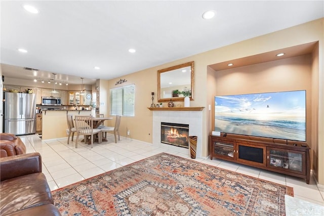 861 Shade Tree Way, Corona, CA 92878 - living area featuring light tile patterned floors, recessed lighting, and a fireplace