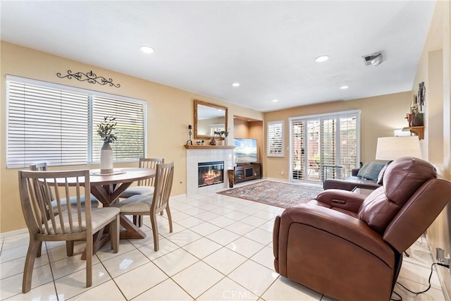 861 Shade Tree Way, Corona, CA 92878 - living area featuring a tiled fireplace, light tile patterned floors, and recessed lighting