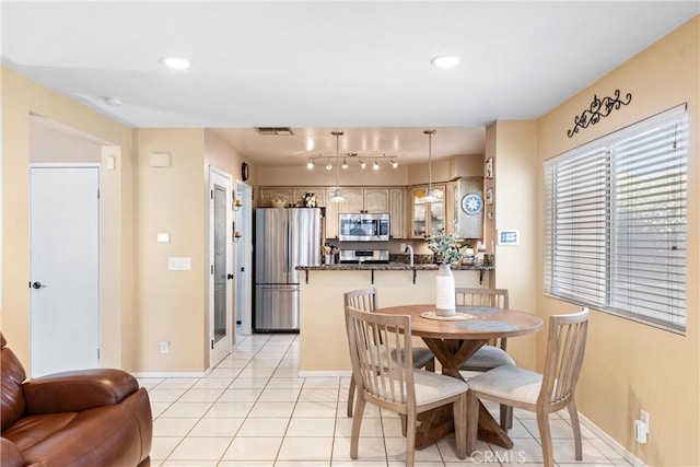 861 Shade Tree Way, Corona, CA 92878 - dining area with light tile patterned floors and recessed lighting