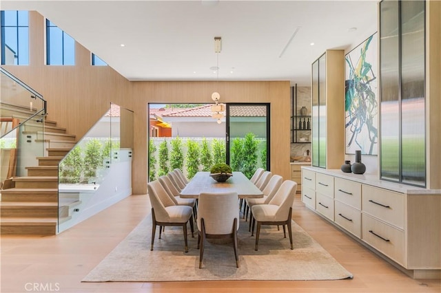 16711 Moorpark St, Encino, CA 91436 - dining area featuring stairway, light wood finished floors, and recessed lighting