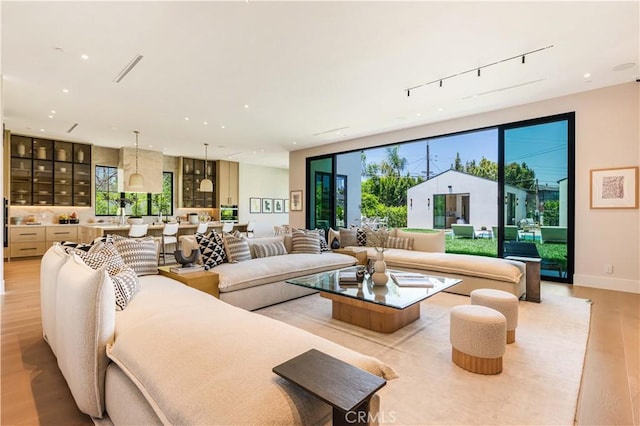 16711 Moorpark St, Encino, CA 91436 - living area with light wood-style flooring, healthy amount of natural light, and recessed lighting