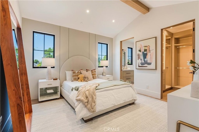 16711 Moorpark St, Encino, CA 91436 - bedroom with a walk in closet, recessed lighting, connected bathroom, and light wood-style flooring