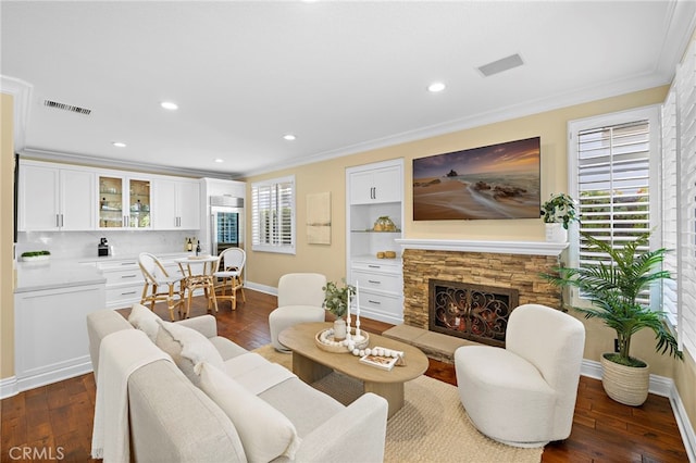 42 Fairlane Rd, Laguna Niguel, CA 92677 - living room with ornamental molding, dark wood-style flooring, a fireplace, and recessed lighting