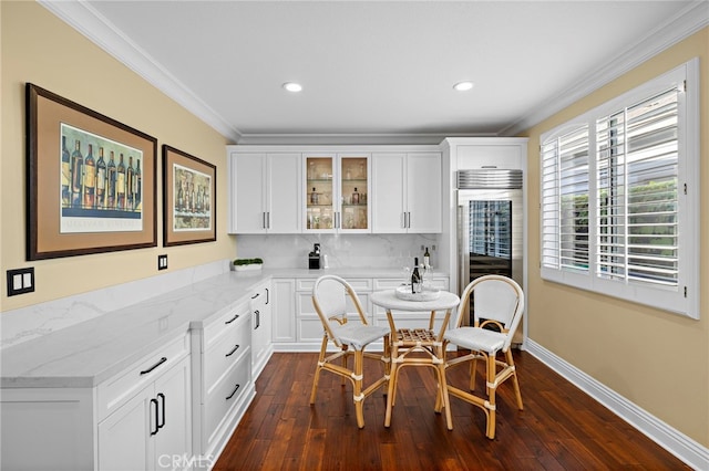 42 Fairlane Rd, Laguna Niguel, CA 92677 - dining area with beverage cooler, crown molding, dark wood-style flooring, and recessed lighting