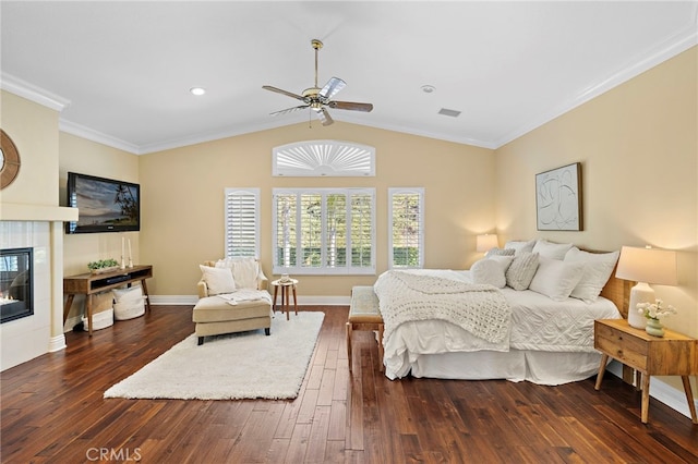 42 Fairlane Rd, Laguna Niguel, CA 92677 - bedroom with dark wood-style floors, a fireplace, lofted ceiling, a ceiling fan, and crown molding