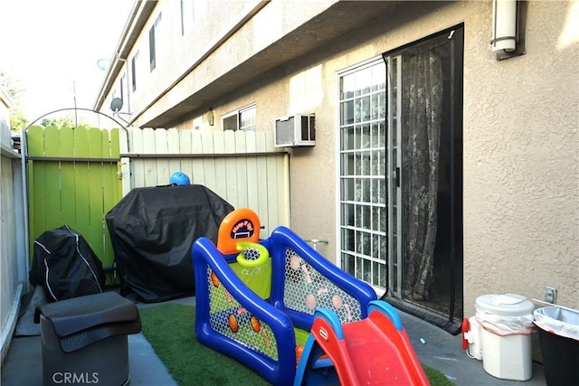 18347 Saticoy St Unit 33, Reseda, CA 91335 - exterior view of stucco siding and a wall unit AC