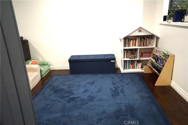 18347 Saticoy St Unit 33, Reseda, CA 91335 - living area featuring wood finished floors and baseboards