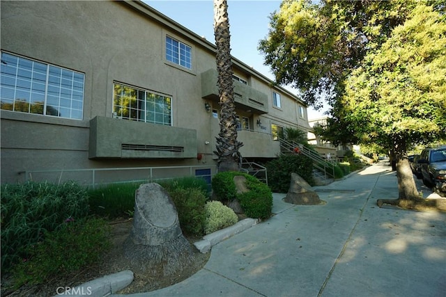 18347 Saticoy St Unit 33, Reseda, CA 91335 - view of property exterior featuring stucco siding