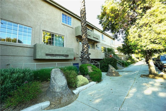 18347 Saticoy St Unit 33, Reseda, CA 91335 - view of property exterior featuring stucco siding