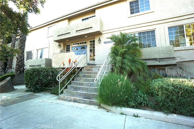 18347 Saticoy St Unit 33, Reseda, CA 91335 - property entrance with stucco siding