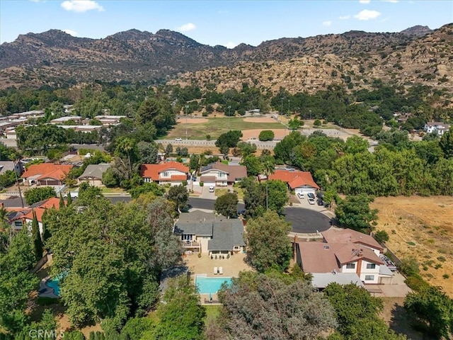 10624 Nevada Ave, Chatsworth, CA 91311 - aerial view of property's location with a mountainous background and nearby suburban area