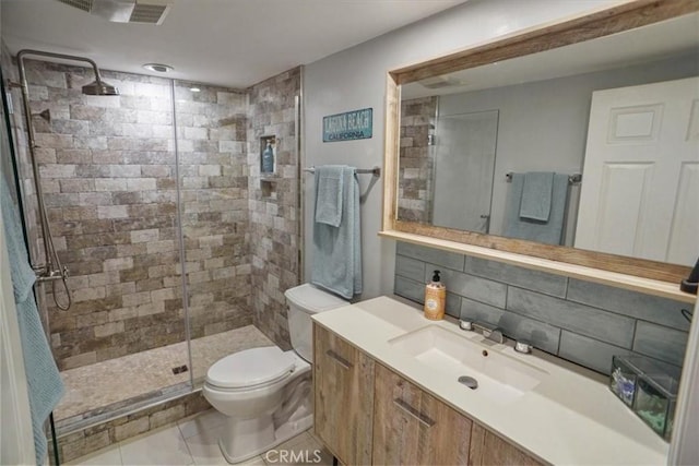 10624 Nevada Ave, Chatsworth, CA 91311 - bathroom with a stall shower, vanity, tasteful backsplash, and tile patterned floors