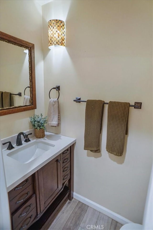 10624 Nevada Ave, Chatsworth, CA 91311 - bathroom with vanity and wood finished floors
