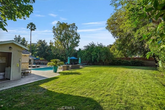 10624 Nevada Ave, Chatsworth, CA 91311 - fenced backyard featuring a patio