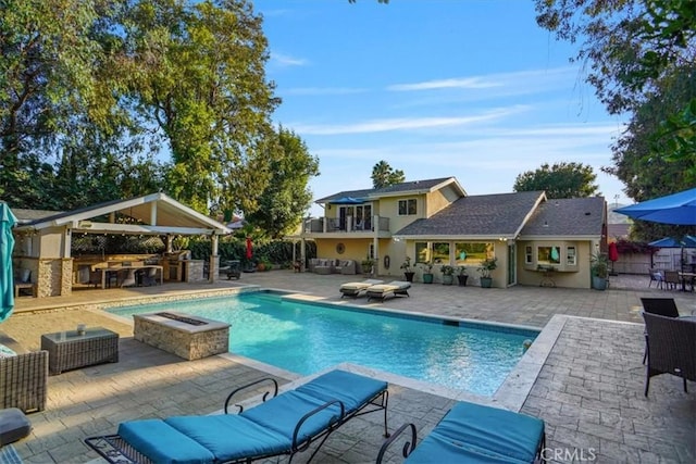 10624 Nevada Ave, Chatsworth, CA 91311 - swimming pool featuring outdoor lounge area, a gazebo, exterior kitchen, and a patio area