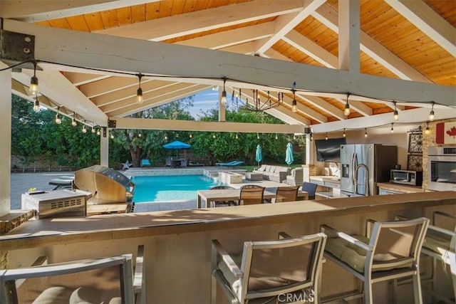 10624 Nevada Ave, Chatsworth, CA 91311 - swimming pool with a gazebo and exterior kitchen