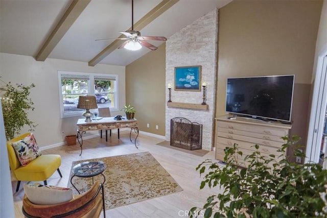 10624 Nevada Ave, Chatsworth, CA 91311 - living area featuring ceiling fan, beam ceiling, a fireplace, and high vaulted ceiling