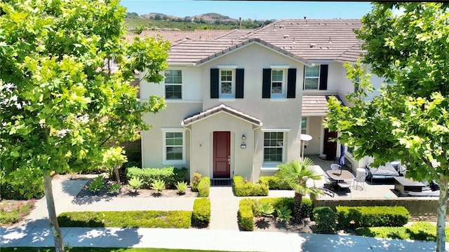 5 Zacate St, Rancho Mission Viejo, CA 92694 - multi unit property featuring a tiled roof, stucco siding, and a patio