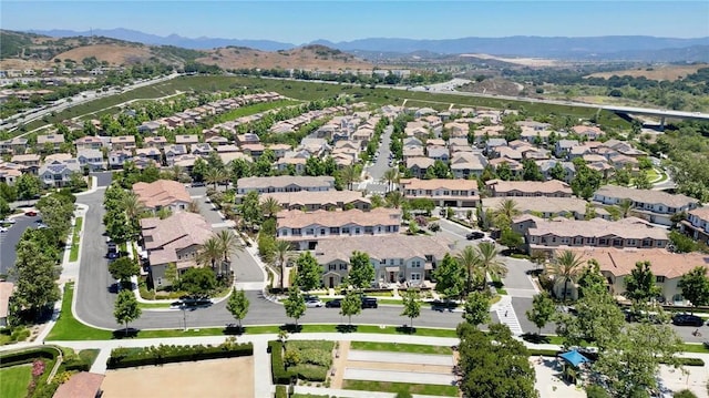 5 Zacate St, Rancho Mission Viejo, CA 92694 - aerial overview of property's location featuring mountains and nearby suburban area