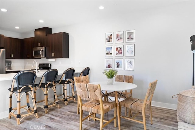 5 Zacate St, Rancho Mission Viejo, CA 92694 - dining area with light wood-type flooring and recessed lighting