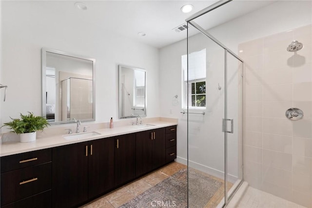 5 Zacate St, Rancho Mission Viejo, CA 92694 - full bathroom featuring a shower stall, double vanity, tile patterned flooring, and recessed lighting