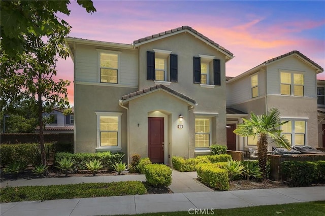5 Zacate St, Rancho Mission Viejo, CA 92694 - view of front of house with stucco siding and a tiled roof