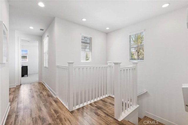 5 Zacate St, Rancho Mission Viejo, CA 92694 - corridor with an upstairs landing, wood finished floors, plenty of natural light, and recessed lighting