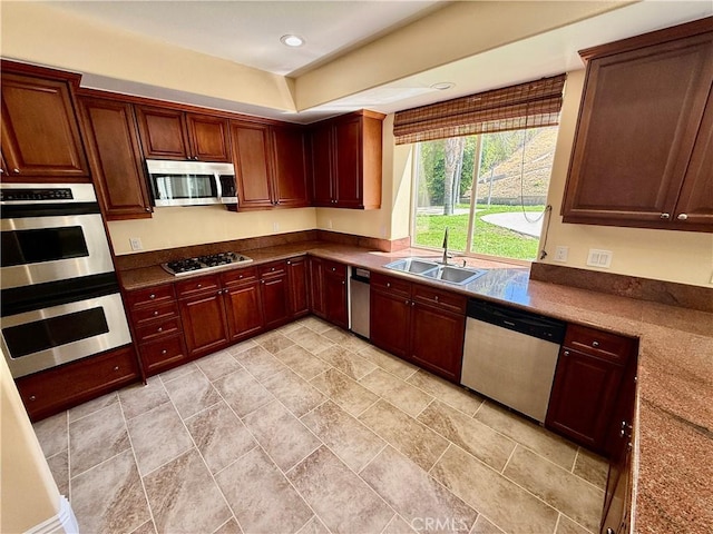 11737 Lois Ct, Granada Hills, CA 91344 - kitchen with stainless steel appliances, light stone finish floors, and recessed lighting