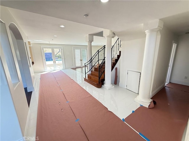 11737 Lois Ct, Granada Hills, CA 91344 - stairs with decorative columns, recessed lighting, french doors, and tile patterned floors